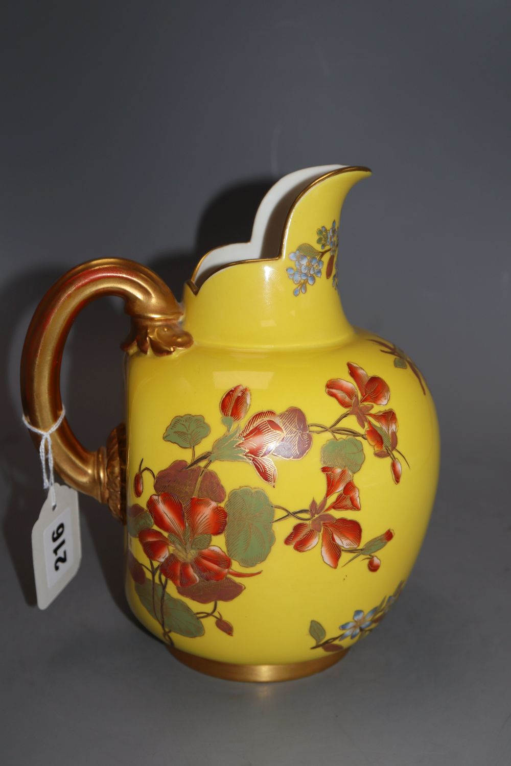 A Royal Worcester yellow ground jug, height 21cm